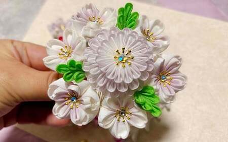 M551 【つまみ細工の髪飾り 淡桜】つまみ細工 髪飾り 絹100％ 成人式 七五三 結婚式 花 水引 絹 寿 淡桜 桜 花 Uピン式 ヘアアクセサリー フラワー ピンク 振袖向け 卒業式 和装 着物 アレンジ自在