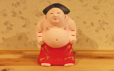 M-AC9.【長谷寺詣で人気の土産品】出雲人形　力士（化粧まわしの色 赤）