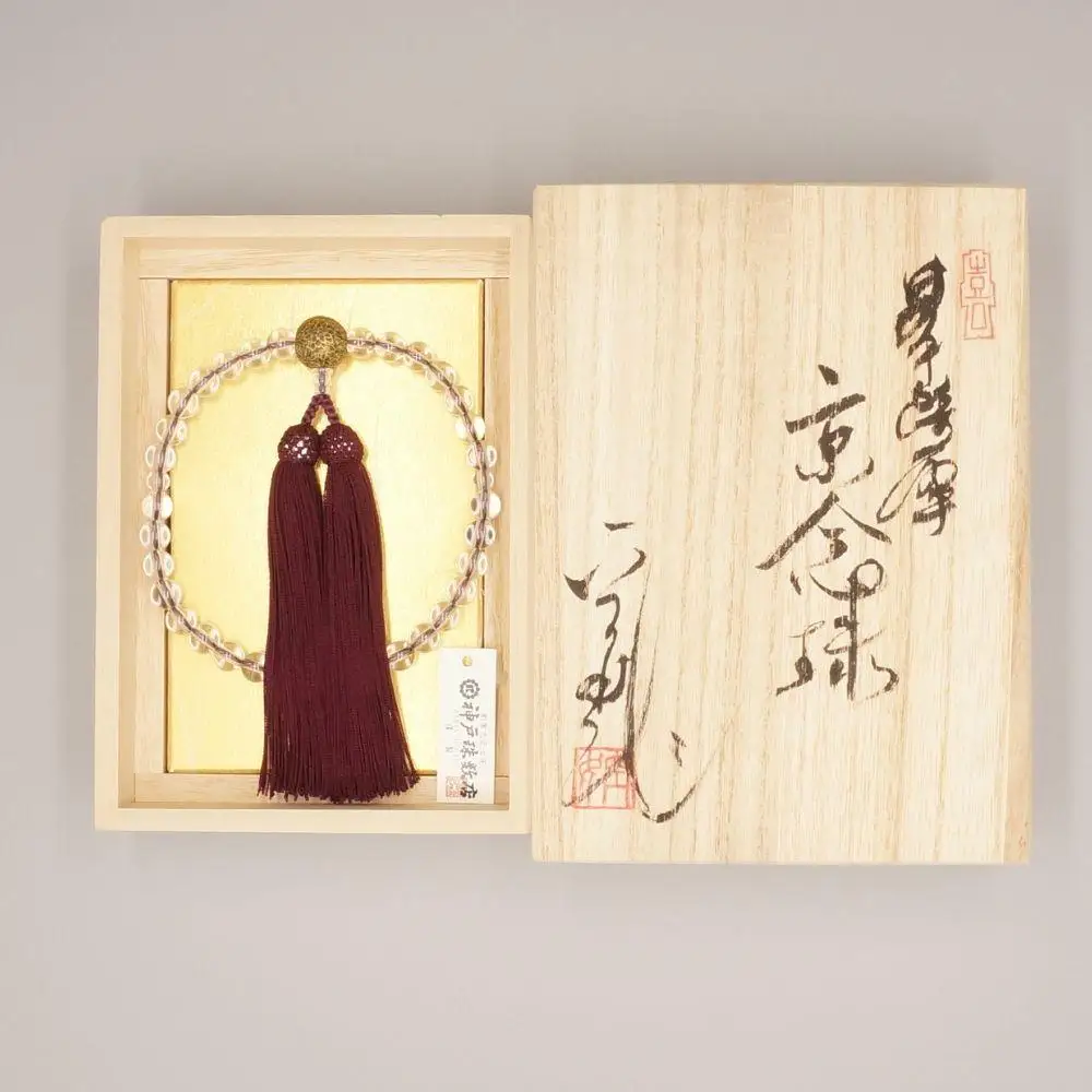 【神戸珠数店】〈京念珠〉空女華薩摩「黒地金彩」特上水晶 女性用数珠