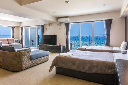 【ふるさと納税】【コンドミニアムホテルモンパ】最上階フロアー１泊素泊まりペア宿泊券  | 沖縄 旅行 人気 ホテル